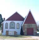 Church of Christ, a white and red building with pointed roof